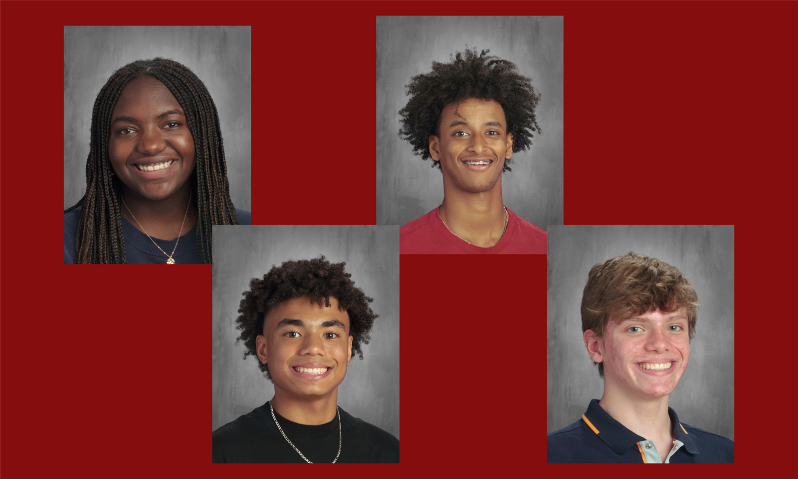 Four students smile